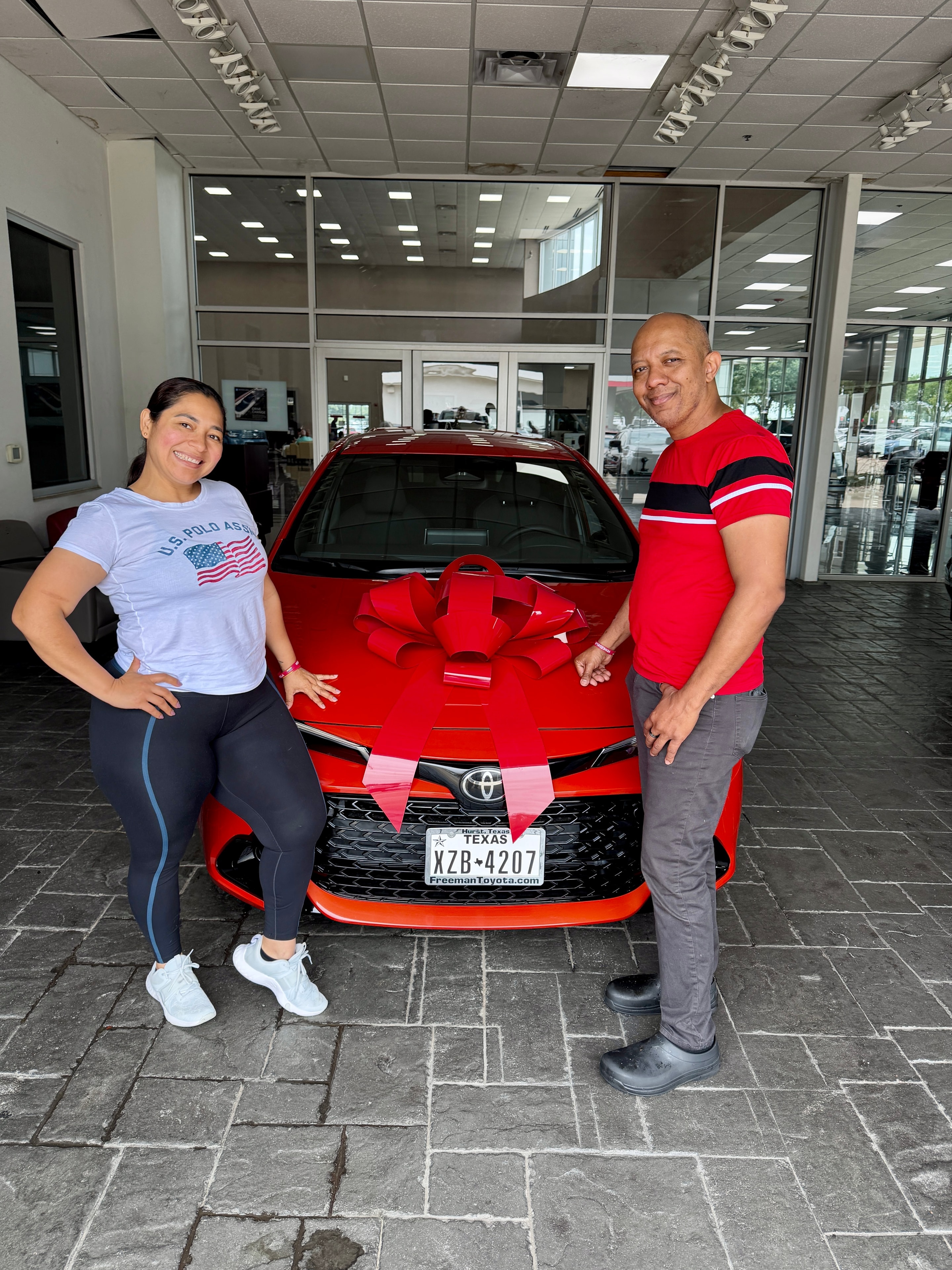 Happy customers with their new Toyota at Freeman Toyota Hurst TX